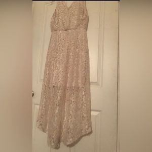 Beautiful lace dress knee length in front maxi length at back